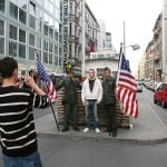 Tourists at Check Point Charlie, Berlin. Image shot 2007. Exact date unknown.